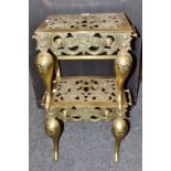 A pair of brass foot men,