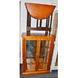 A contemporary pine glazed cabinet; a 20th century oak drop leaf, gateleg table,