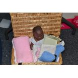 Dolls - a 20th century black baby doll; a dolls house bed;