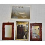 A pair of Oriental style faux bamboo framed wall mirrors, cross hatch design frames,
