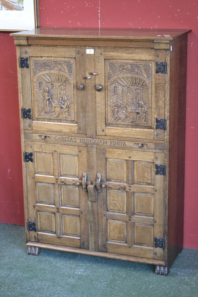 An oak Rupert Griffith Flemish wine cupboard,