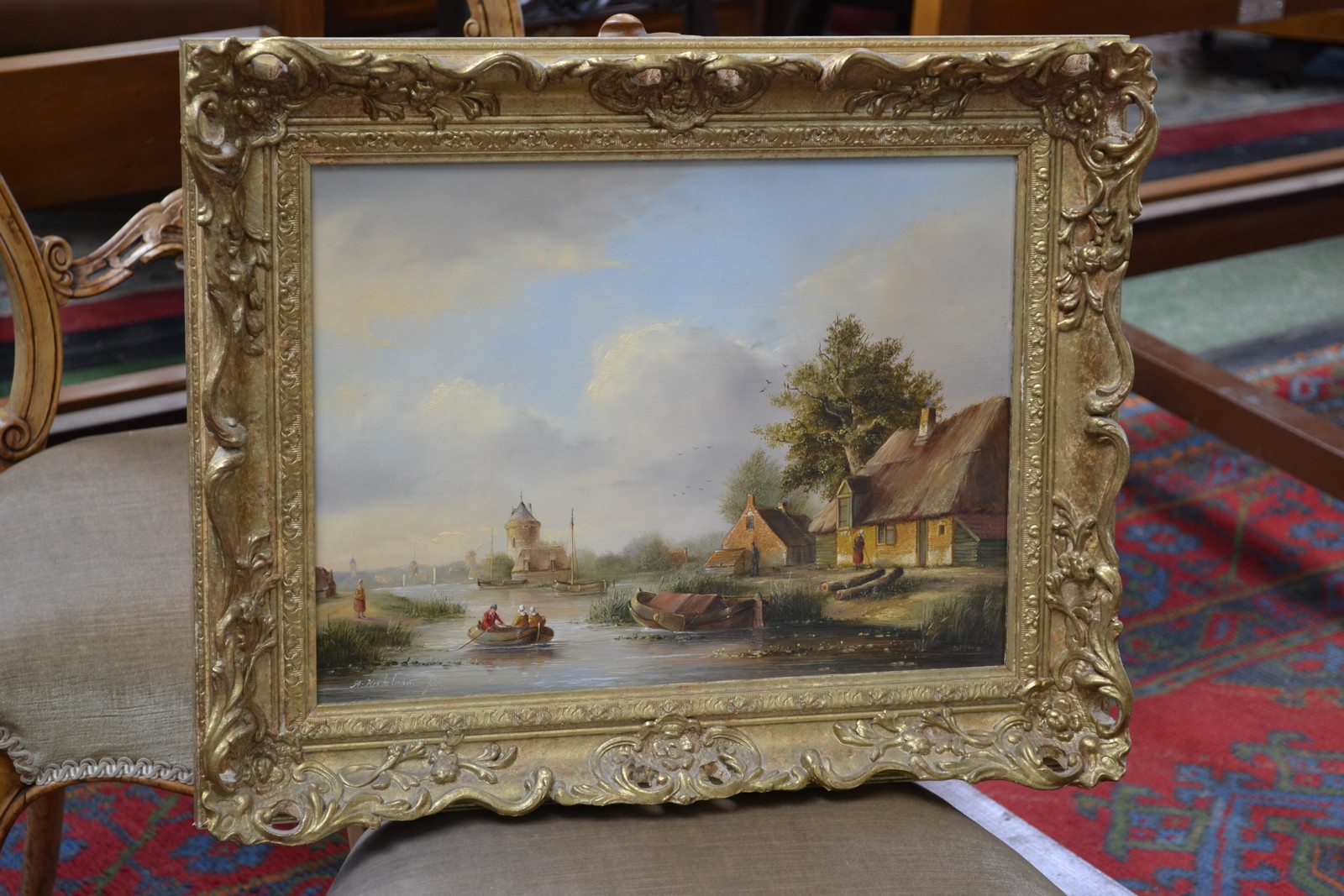 A Herkelman (continental school) On the river oil on board, signed and framed.