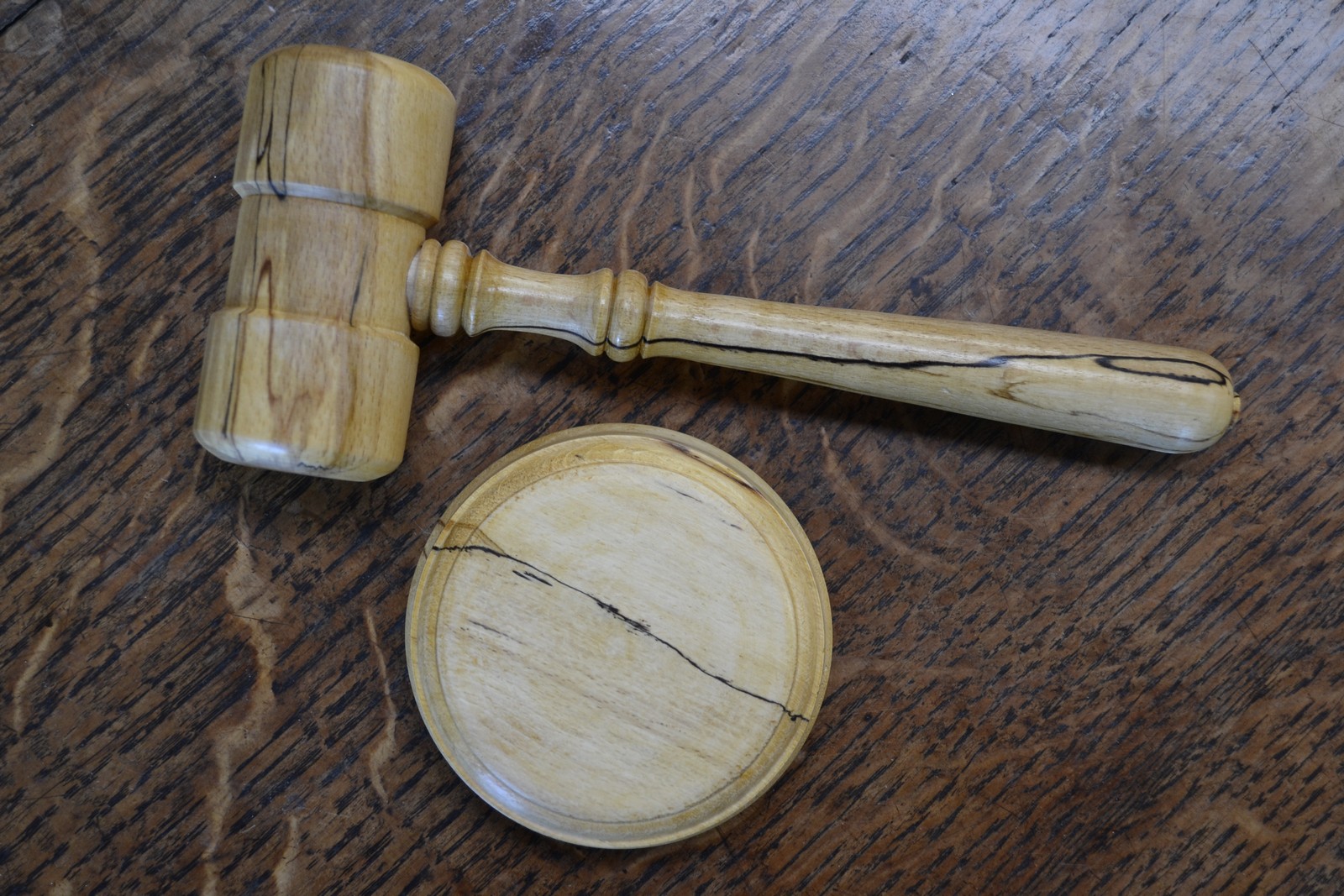 A turned spalted beech gavel and block.