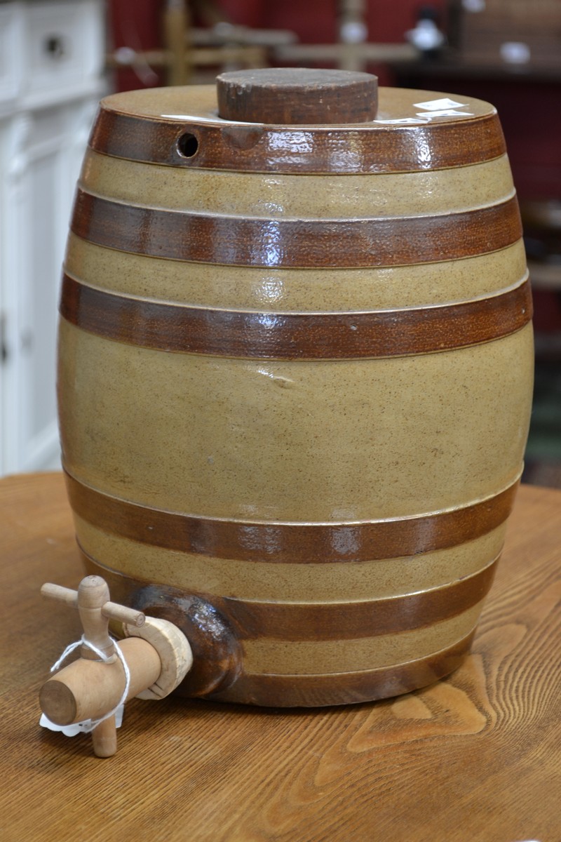 A 20th century salt glazed stoneware wine barrel.