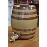 A 20th century salt glazed stoneware wine barrel.