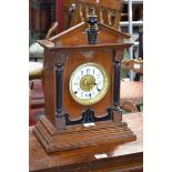 A 20th century oak mantel alarm clock, Fattorini & Sons, Bradford,