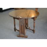 An oak gateleg occasional table circa 1800.