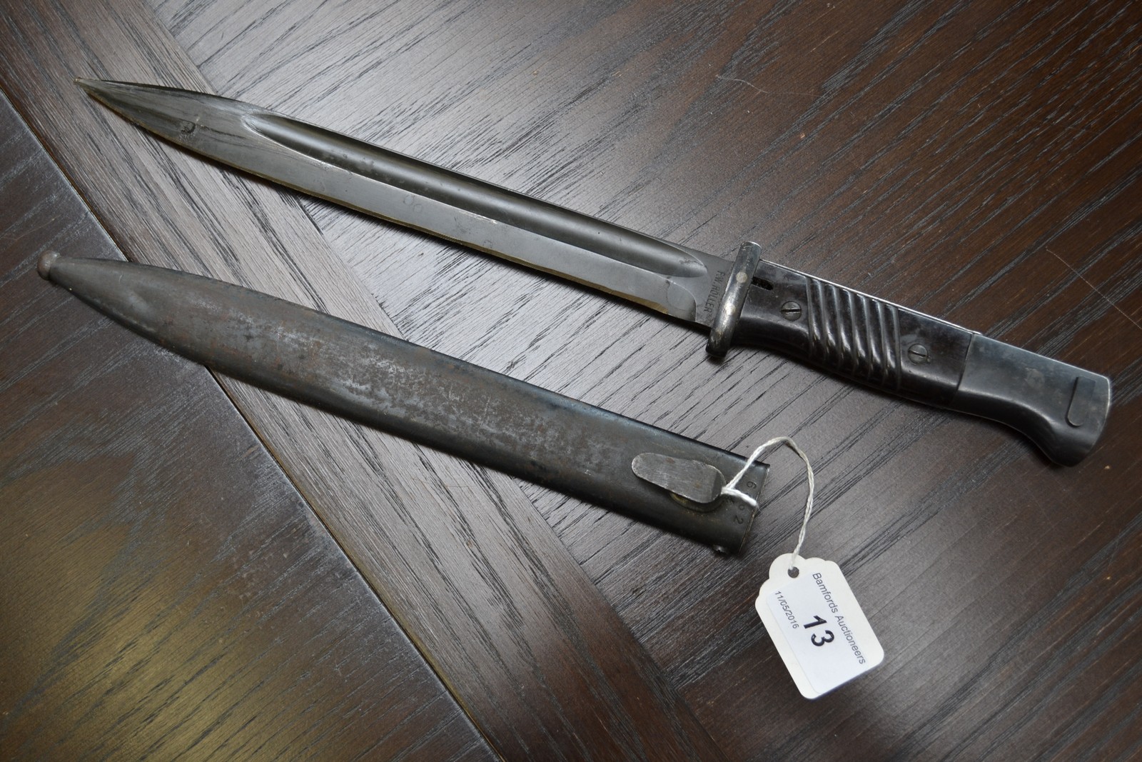 A German bayonet and scabbard, marked F.W.