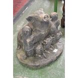 A French style garden ornament with a pig and piglets