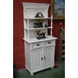 A Victorian painted pine dresser of small proportions two shelves supported by columns,