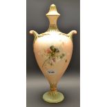 A Royal Worcester blush vase and cover decorated flowers
