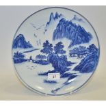 A Chinese blue and white under glazed dished bowl, Landscape scene,