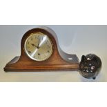 A 1930s oak Napoleon hat mantel clock;