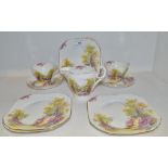 A Shelley English Charm pattern part tea service, comprising two cups, milk jug, four saucers,