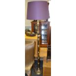 A mid 20th century faux bamboo brass standard lamp