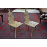 A pair of ash chairs, shaped backs,
