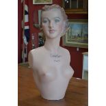 Advertising - a French 1940's style female nude bust, shop dummy, Champs Elysées, Paris,