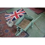 A novelty Wheel Barrow Garden planter; a Flag Poll;