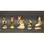 A Royal Doulton Bunnykins, boxed; others, Family Photograph, Rise and Shine, School Girl,