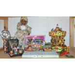 Toys and Juvenalia - a Stylophone, boxed; a musical merry-go-round; a locomotive and camera,