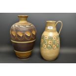 A Denby ribbed inverted baluster vase, 36cm high; another Denby vase with single handle,