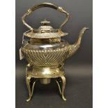 A 19th century silver plated spirit kettle on stand with burner