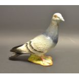 A Beswick model of a pigeon, grey,1383,impressed mark.