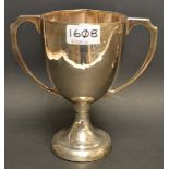 A silver two handled pedestal trophy cup, Sheffield 1937,