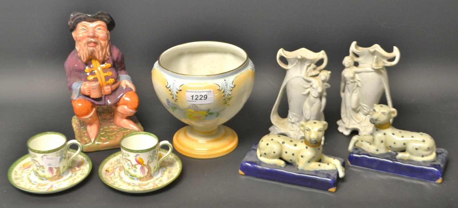 A Grimwades vase; a Melba ware jug; a pair of stuffed Dalmatians; a pair of Art Nouveau vases;