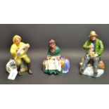A Royal Doulton figure, A Good Catch, HN2258; others, The Boatman, HN2417, Silk and Ribbons,