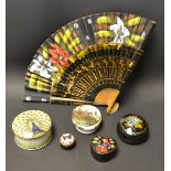 A hand painted fan with lillies ; a paper mache heart shaped box; another similar;