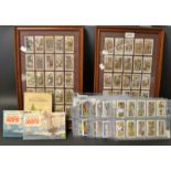 Cigarette Cards - two framed sets; three albums; some first editions in sleeves;
