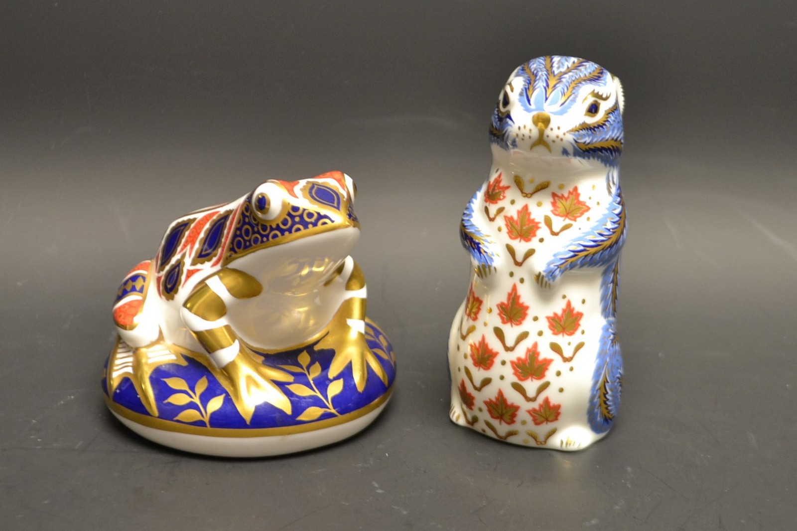 A Royal Crown Derby Paperweight, Frog, gold stopper; another, Chipmunk,