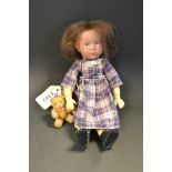 An early 20th century miniature Kammer and Reinhardt bisque head doll, fixed blue eyes,