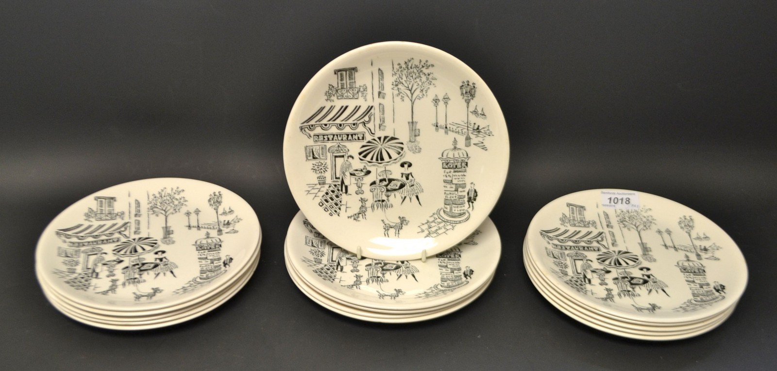 Fifteen Parisienne plates, 20cm diam.