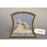 A French silver-gilt incurved arched rectangular easel timepiece, 6.