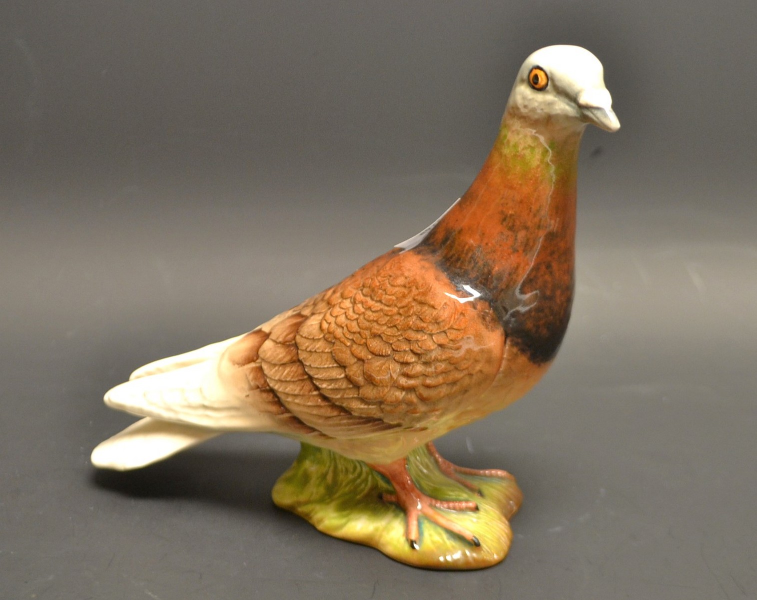 A Beswick model of a pigeon,brown,1383,impressed mark.