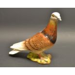 A Beswick model of a pigeon,brown,1383,impressed mark.