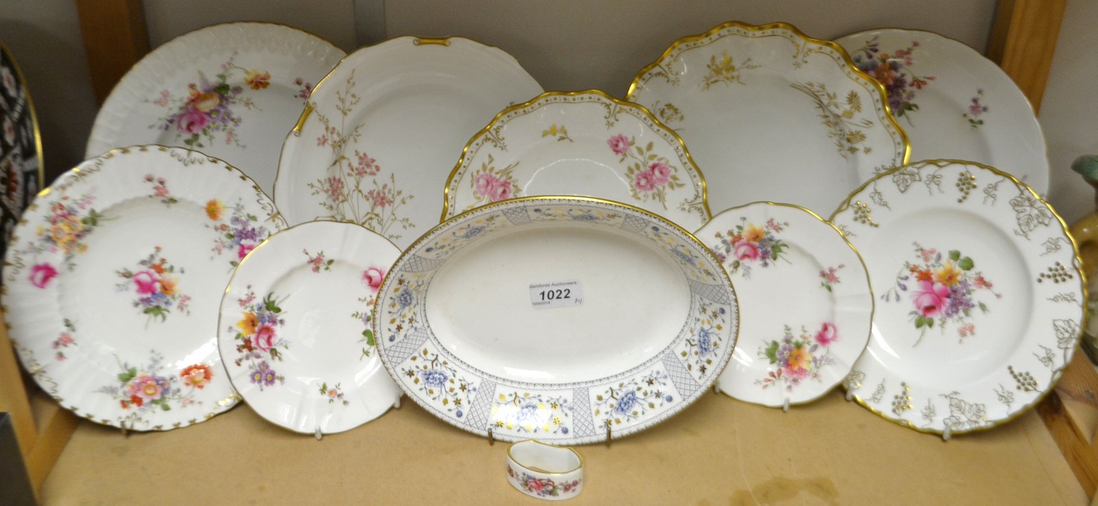 A Royal Crown Derby - A Pinxton rose fluted dessert plate,