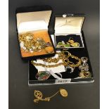 A 9ct gold Sagittarius zodiac pendant; a 9kt locket and chain; costume jewellery; dress rings;