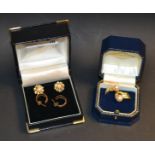 A pair of pearl and 9ct gold flower head earrings,