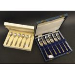 A set of six silver cake forks, Sheffield 1958, cased; a set of six continental silver teaspoons,