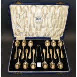 A set of twelve Rat's Tail pattern teaspoons and a pair of sugar bows, London 1933,