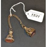 A Regency gilt fob set with purple stone;