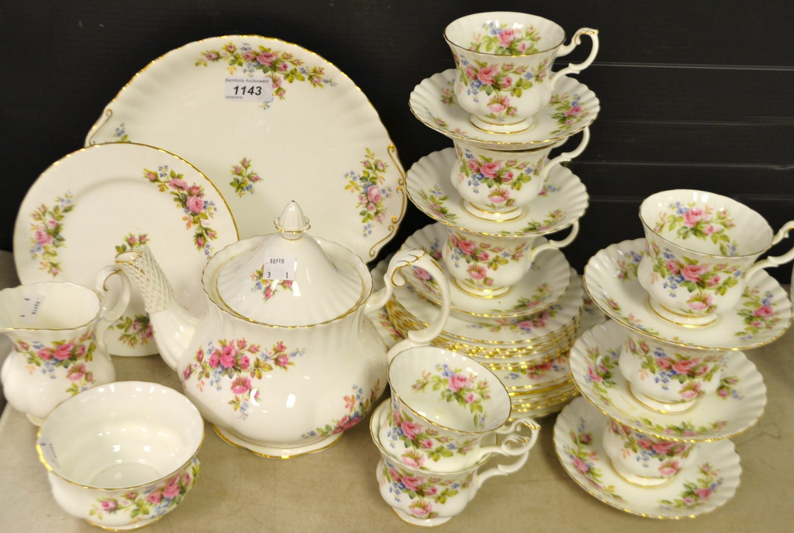 A Royal Albert Moss Rose pattern tea service for six inc teapot, cake plate, cups,