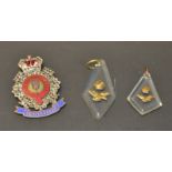 A Duke of Edinburgh's Own Rifles enamel badge;