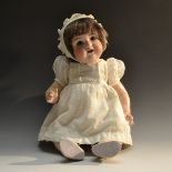 Armand Marseille a 990/10 bisque head baby doll, open close brown eyes, composite body and limbs,