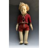 Lenci - a felt boy doll dressed as Christopher Robin, dressed in a knitted jacket and felt shorts,