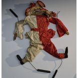 A vintage Human Puppet body, Clown, fabric body, carved wooden hands and feet operated by wire arms,