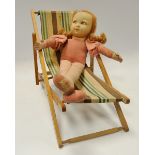 A Norah Wellings felt doll, with light brown plaited hair, brown eyes, 44cm high,